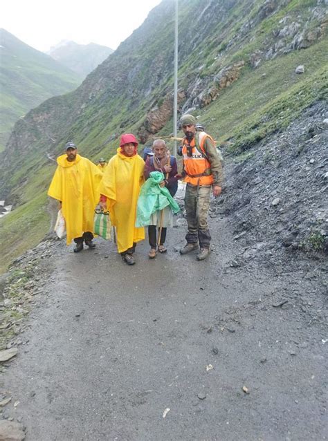 Rain falls near Amaranath Cave, flooding lashes Hindu pilgrimage ...