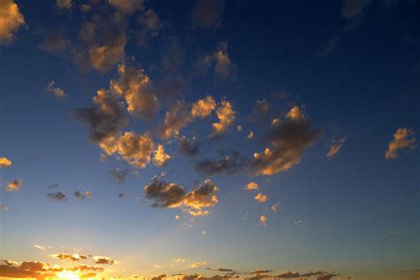 Scattered Clouds At Sunset Photograph by Paul Cutright