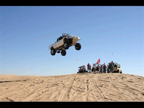 Ford F-150 and Chevy Silverado Prerunners Jumping - YouTube