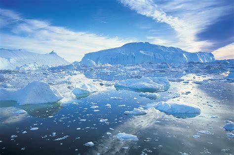 Icebergs, Disko Bay, Greenland by Peter Adams