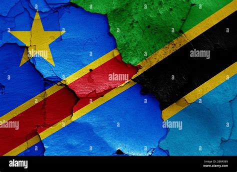 flags of DR Congo and Tanzania painted on cracked wall Stock Photo - Alamy