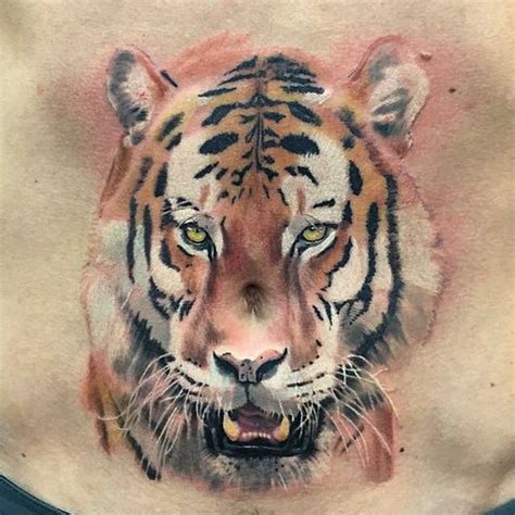 Conor McGregor's realistic tiger tattoo on the stomach.