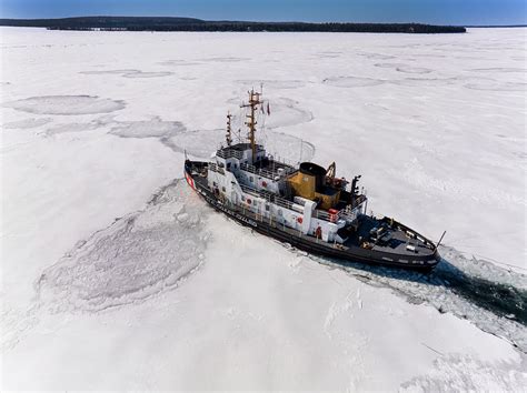 USCG Neah Bay Breaking Ice Photograph by Mike Roemer - Fine Art America