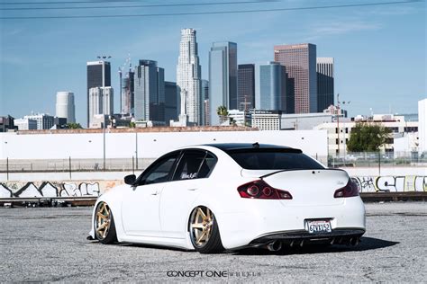 White Stanced Inifniti G37 Slammed and Enriched with Carbon Fiber Lip — CARiD.com Gallery