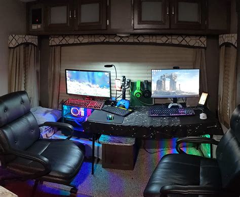 Temporary setup with 2 gaming rigs until we build the perfect tables ...