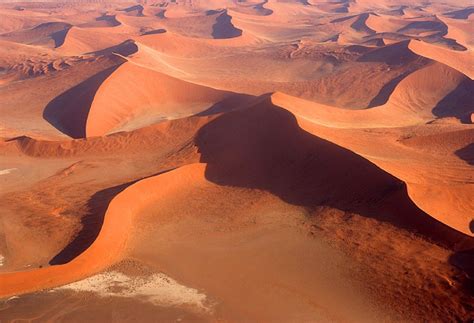 STAR DUNES have multiple ridges formed by multi-directional winds ...