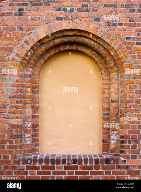 The beautiful blind window in the old brick wall Stock Photo - Alamy