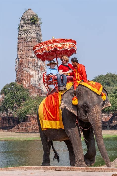 Tourists Enjoy the Elephant Ride Guided by a Mahout in Ayutthaya Editorial Image - Image of ...