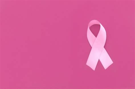 Premium Photo | Pink october pink ribbon on pink background