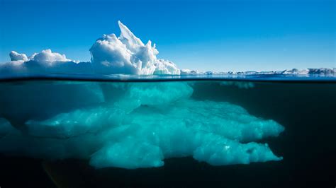 Ice formation above and below the waterline, Admiralty Inlet, Northern Baffin Island, Canada ...