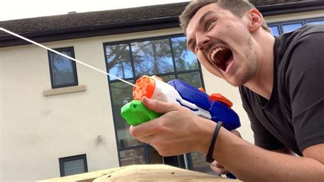 SURPRISE WATER GUN PRANK! - YouTube