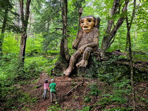 Giant wooden troll that became local sensation retreats from public ...