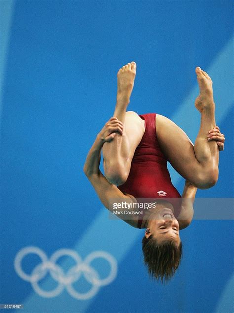 Tania Cagnotto of Italy competes in the women's diving 3 metre springboard preliminary event on ...