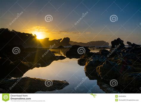 Rocky Beach Sunrise stock photo. Image of ocean, travel - 44494654