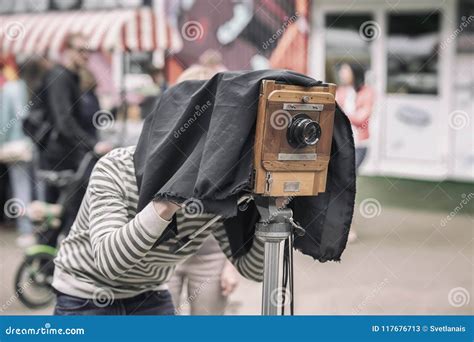 Photographer with Vintage Wooden Camera Under Dark Cloth Cape, Photographing Clients, Artifact ...