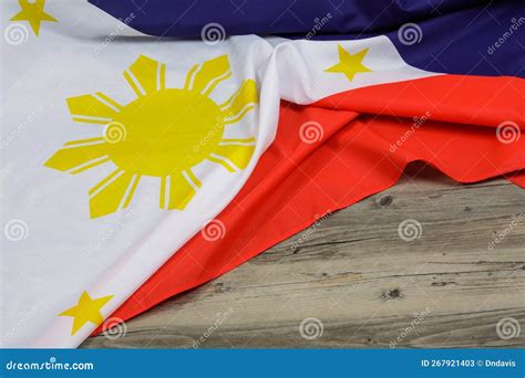 Philippine Flag Draped Over a Wooden Background Stock Image - Image of history, force: 267921403