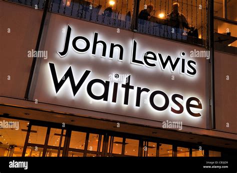 John Lewis and Waitrose logo on entrance to Kingston ,Surrey shop Stock Photo, Royalty Free ...