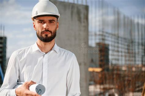 Portrait of Man that is in Uniform on the Construction Site Stock Photo ...