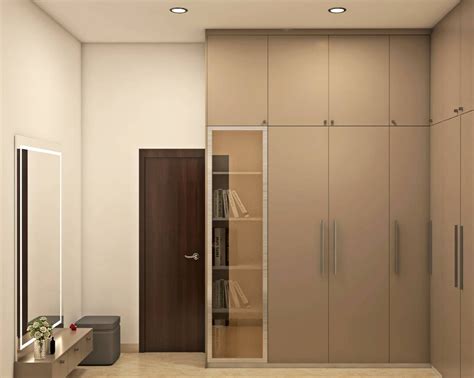 L-Shaped Modern Wardrobe With Loft Section | Livspace