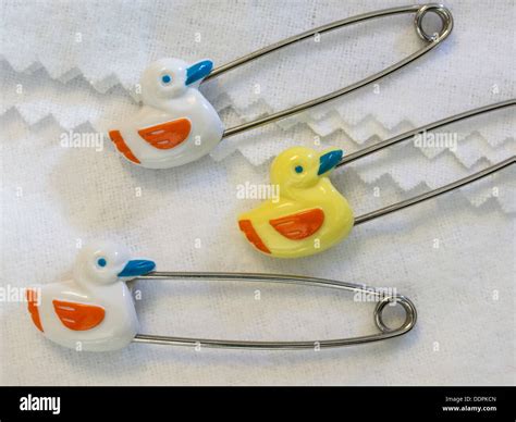 Three Vintage Diaper Pins Stock Photo - Alamy