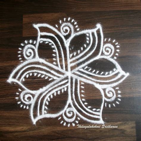 Simple rangoli design for Tamil New Year Simple kolam rangoli design at home for Tamil New Year