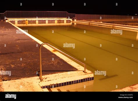 NIGHT TIME VIEW OF A SWIMMING POOL Stock Photo - Alamy