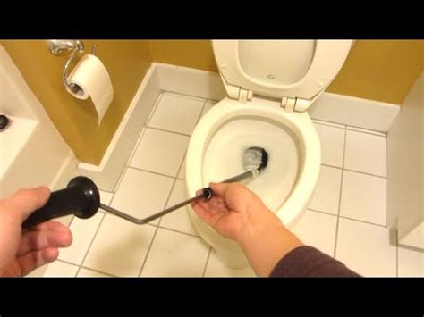 How To Use a Toilet Snake Properly | Clogged Blocked Toilet Repair using Toilet Auger - YouTube