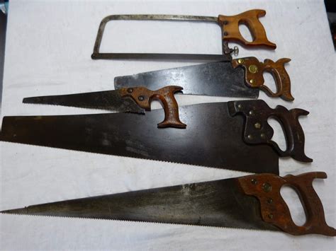 Lot # 320 Nice collection of antique hand saws - Consider It Sold