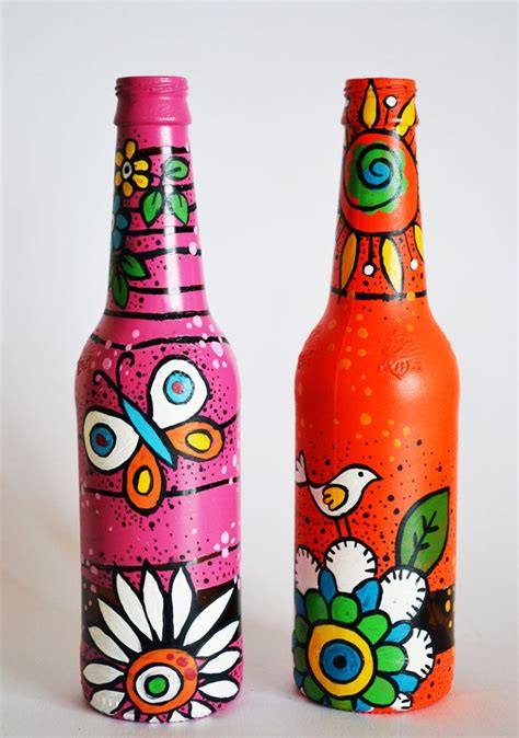 repainted and recycled beer bottle as vases or for by Indybindi | Bottle art, Painted glass ...