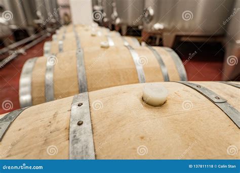 Oak Barrels for Aging Wine in a Modern Winery Stock Photo - Image of ...