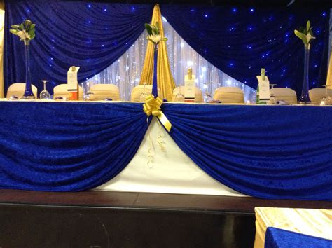 Royal blue and gold backdrop | Blue wedding decorations, Blue gold ...