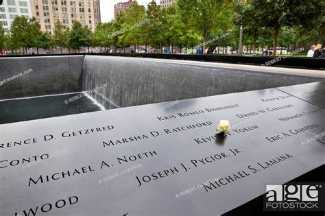 Names of the September 11 victims inscribed on bronze plates attached ...