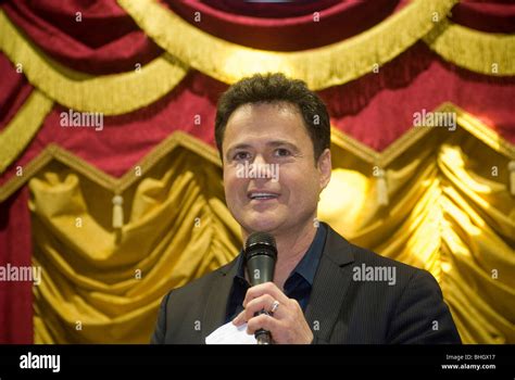 Donny Osmond promotes the new Fisher-Price "Dance Star Mickey" doll at Toy Fair in New York ...