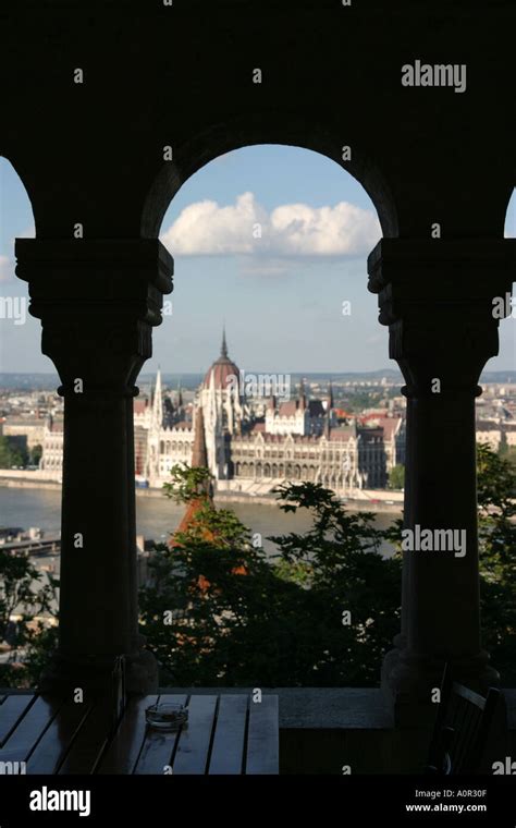 Parliament building seen through an arch in Budapest Hungary Stock Photo - Alamy