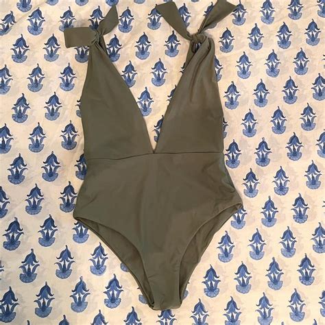 Green one piece swimsuit with tie strapped shoulders... - Depop