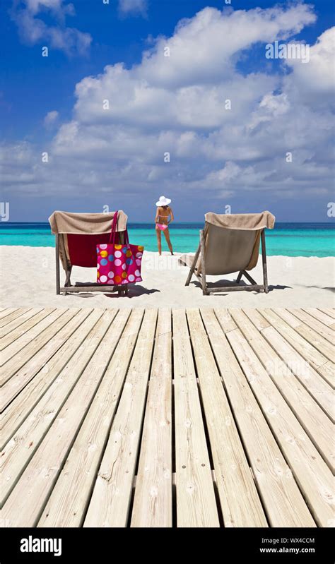 Beautiful beach terrace in the Maldives with bikini model Stock Photo ...