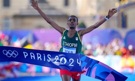 Tamirat Tola the excluded reserve athlete Wins Gold in Men’s Marathon ...