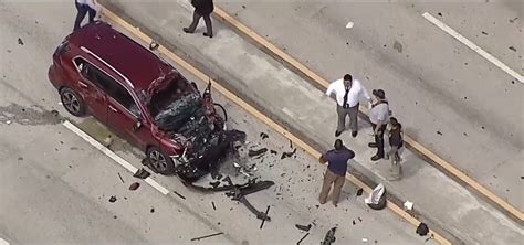 Miami plane crash victim named as horror pictures show fiery collision with SUV in Haulover Park ...