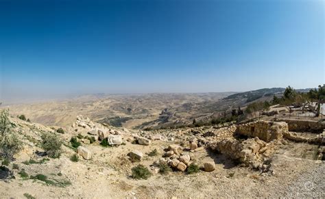 View of the Promised Land from Mount Nebo. Moses Memorial basilica is at the top of the mountain ...