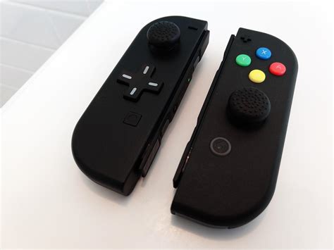 Nintendo Switch Joy-Cons painted black with D-pad and colored ABXY ...