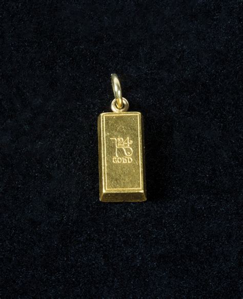 Lot 69F: Gold Ingot Pendant - Willis Henry Auctions, Inc.