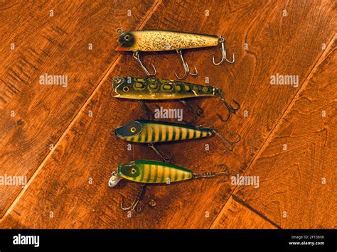 Wooden vintage colorful fishing lures Stock Photo - Alamy