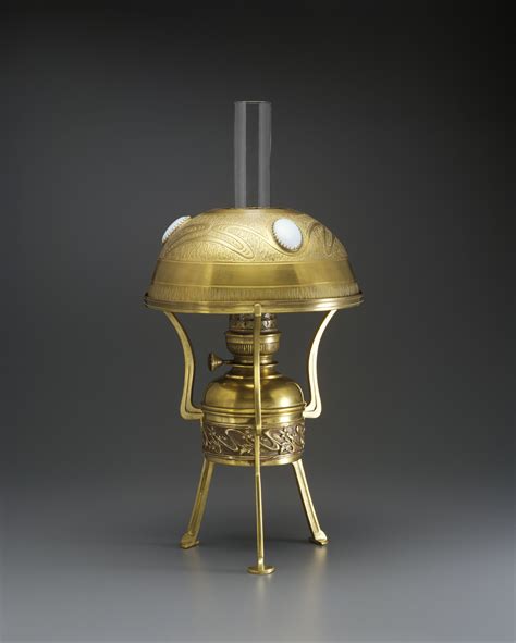 Table oil lamp, art nouveau style, bronze, brass and glass, made in France, c.1900, with a ...