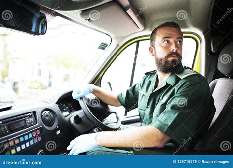 Male Paramedic Driving an Ambulance Stock Image - Image of responder, caucasian: 129715579