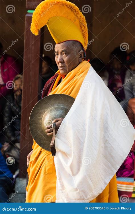 Yellow-hat Buddhist Monk Playing Cymbals at the Masked Dances, Mani ...