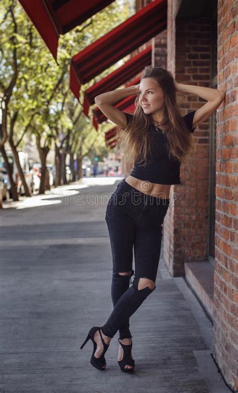 Beautiful Young Woman Smiling Outdoors Stock Photo - Image of girl, casual: 99538936