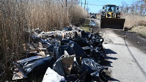 Brookhaven Town seeks to increase fines for illegal dumping after demolition materials left in ...