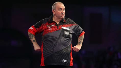 Phil Taylor beats Gary Anderson to reach last four, keep world title ...