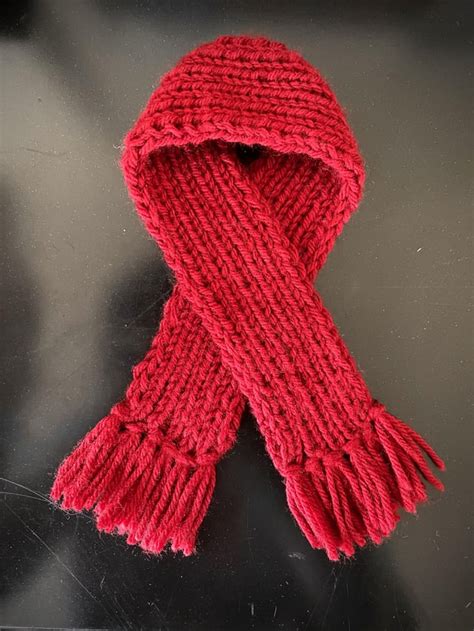 Had some scrap yarn so I knitted a mini version of Mikasa’s scarf : r ...