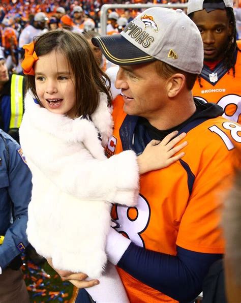 Peyton Manning and Mosley Manning | Peyton manning, Peyton manning ...